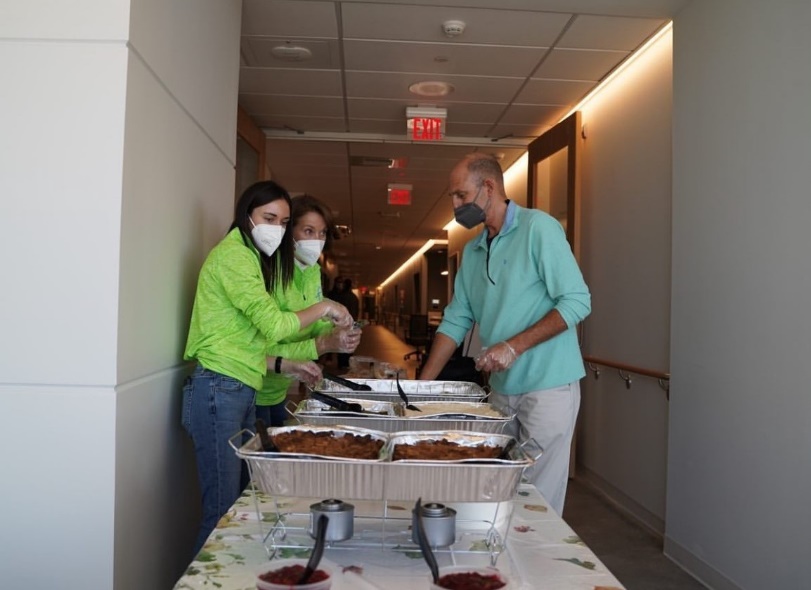 HEADstrong event table of food and workers